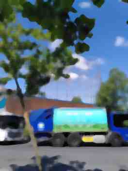 trucks queueing gas holder behind