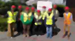 visitors and host in PPE